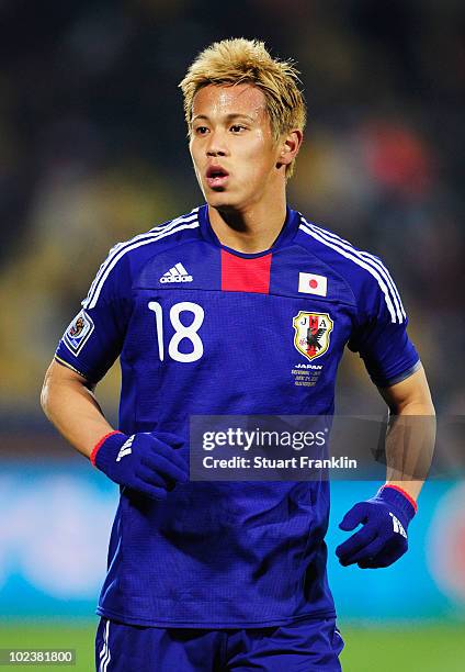 Keisuke Honda of Japan in action during the 2010 FIFA World Cup South Africa Group E match between Denmark and Japan at the Royal Bafokeng Stadium on...