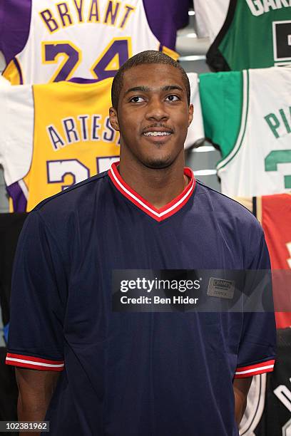 Basketball player Derrick Favors visits Champs Sports on June 24, 2010 in New York City.