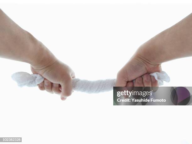 a wrung towel. - drying stockfoto's en -beelden