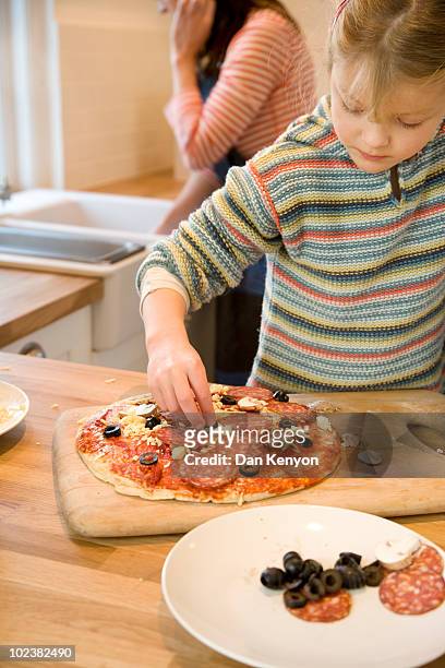pizza making - making pizza stock pictures, royalty-free photos & images