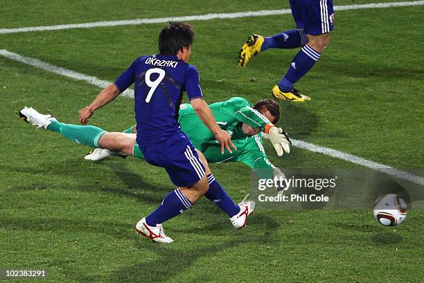 Shinji Okazaki of Japan scores his team's third goal during the 2010 FIFA World Cup South Africa Group E match between Denmark and Japan at the Royal...