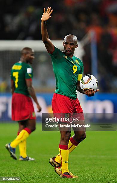 Samuel Eto'o of Cameroon is dejected after defeat and elimination from the tournament in the 2010 FIFA World Cup South Africa Group E match between...