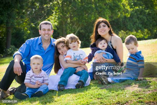 young family with five small children - family with five children stock pictures, royalty-free photos & images
