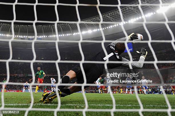 Samuel Eto'o of Cameroon scores a penalty kick past Maarten Stekelenburg of the Netherlands during the 2010 FIFA World Cup South Africa Group E match...