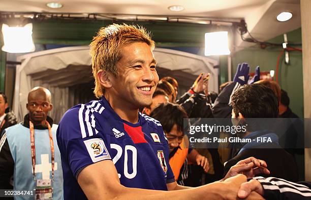 Junichi Inamoto of Japan celebrates in the tunnel after the 2010 FIFA World Cup South Africa Group E match between Denmark and Japan at the Royal...