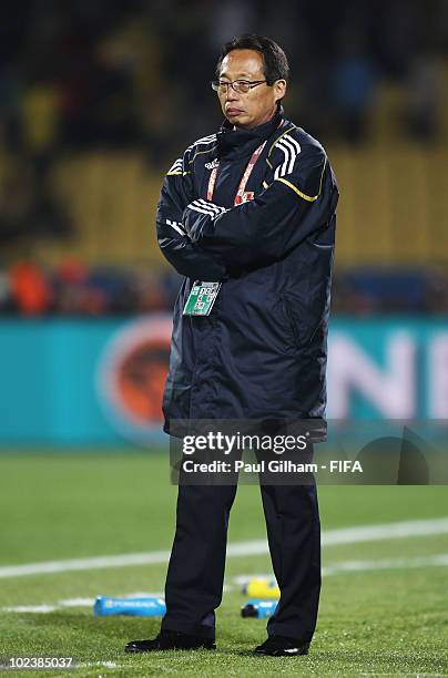 Takeshi Okada head coach of Japan looks on during the 2010 FIFA World Cup South Africa Group E match between Denmark and Japan at the Royal Bafokeng...