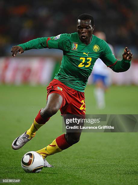 Vincent Aboubakar of Cameroon runs with the ball during the 2010 FIFA World Cup South Africa Group E match between Cameroon and Netherlands at Green...