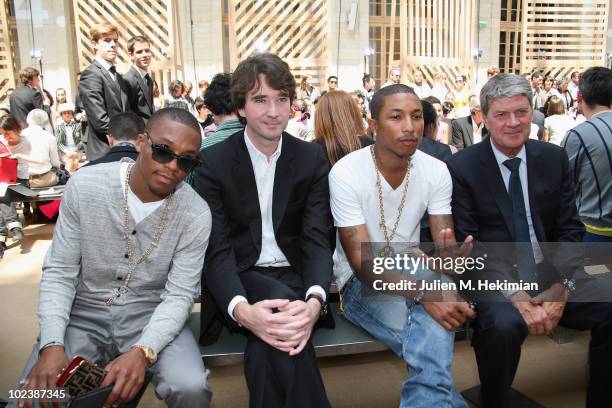 Lupe Fiasco, Antoine Arnault, Pharrel Williams and Yves Carcelle attend the Louis Vuitton fashion show as part of Paris Menswear Fashion Week...