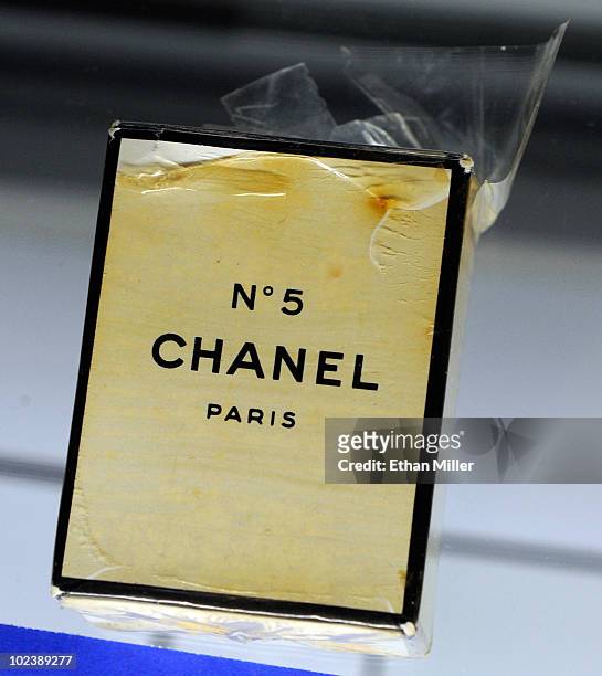 An unopened bottle of Chanel No. 5 perfume in its original plastic wrap and box, owned by Marilyn Monroe, is displayed at Julien's Auctions annual...