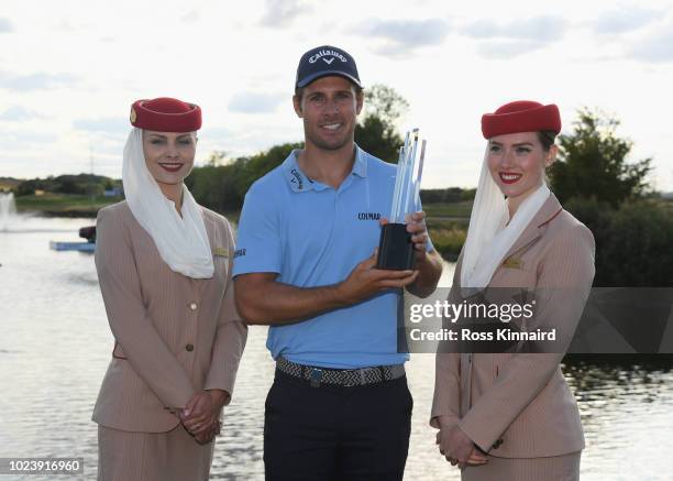 Andrea Pavan of Italy celebrates victory the trophy on day four and final round of the the D+D REAL Czech Masters at Albatross Golf Resort on August...