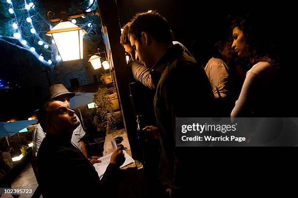 Palestinian and international patrons line up outside the Orjuwan Lounge on June 24, 2010 in Ramallah, West Bank. Nightlife in Ramallah is on the...