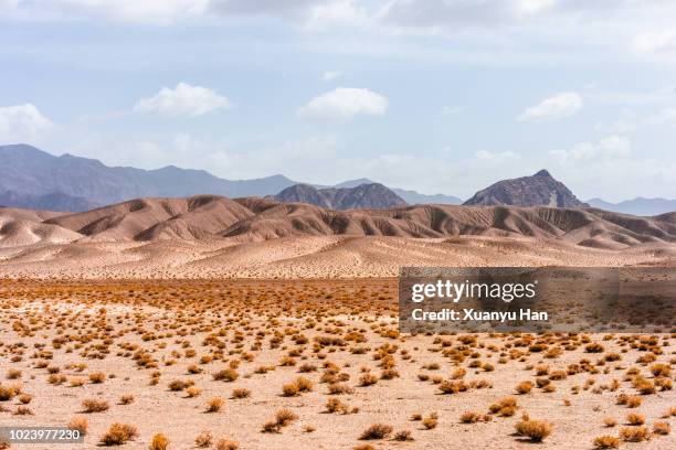 scenic view of mountains against clear sky - árido fotografías e imágenes de stock