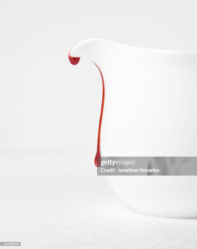 White jug with strawberry drip