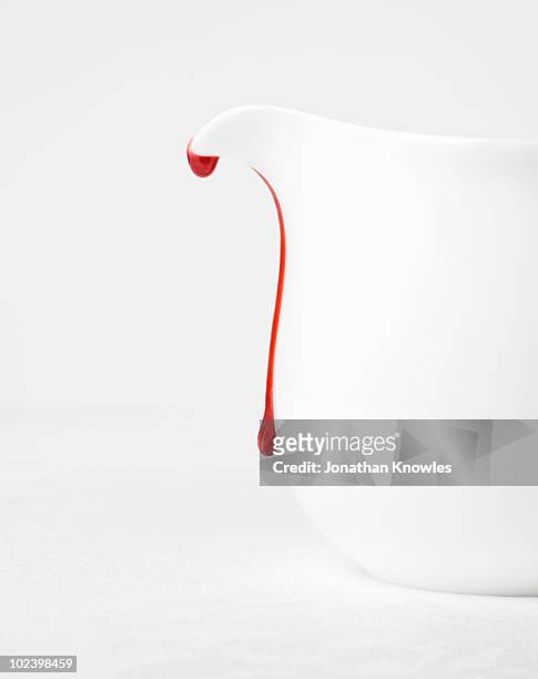 white jug with strawberry drip - strawberry syrup stock pictures, royalty-free photos & images