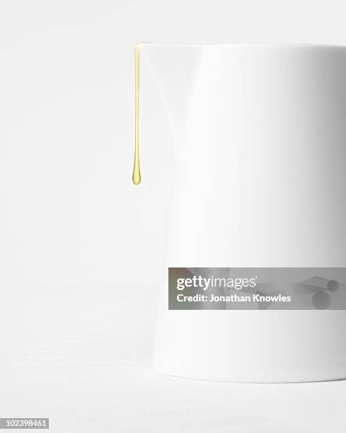 white jug with a syrup drip - syrup stock pictures, royalty-free photos & images