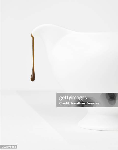 white jug with chocolate drip - sauce stock pictures, royalty-free photos & images