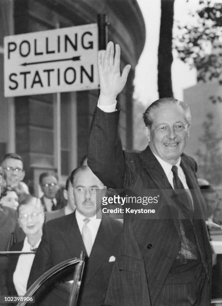 British Prime Minister Harold Macmillan leaving the polling station at Westminster City Hall after casting his vote in the General Election, 8th...