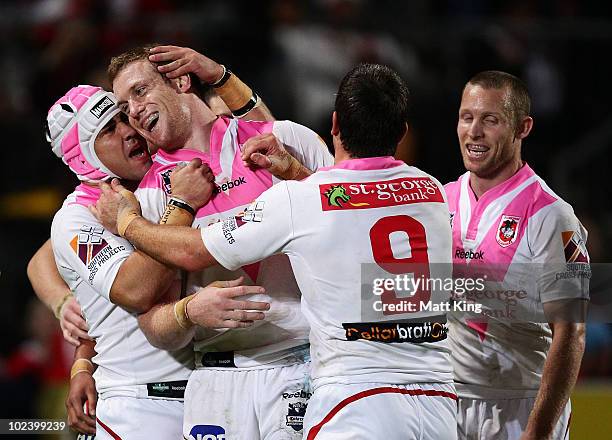 Ben Creagh of the Dragons celebrates with Jamie Soward after scoring a try during the round 16 NRL match between the St George Illawarra Dragons and...