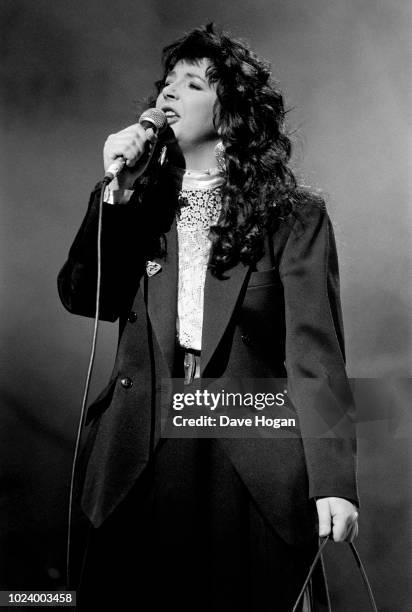 Musician Kate Bush performing on stage at the Secret Policeman's Ball, in aid of Amnesty International, at London Palladium, March 1987.