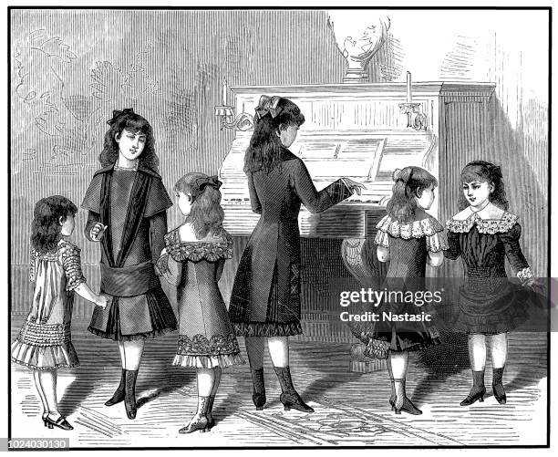 victorian children singing and dancing along with piano playing - singing stock illustrations