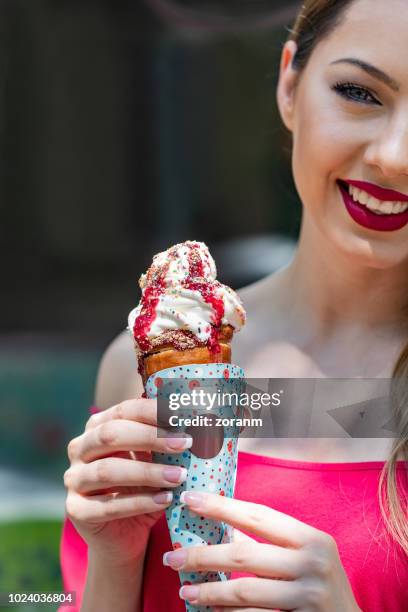 happy woman with ice cream - glace cornet stock pictures, royalty-free photos & images