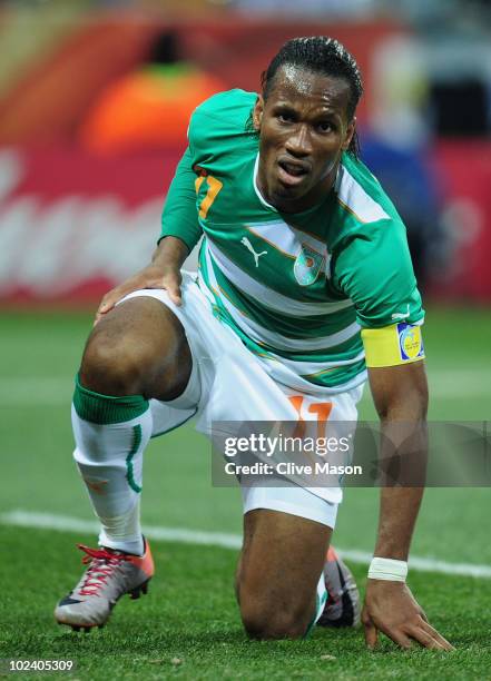 Didier Drogba of the Ivory Coast picks himself up from the pitch during the 2010 FIFA World Cup South Africa Group G match between North Korea and...