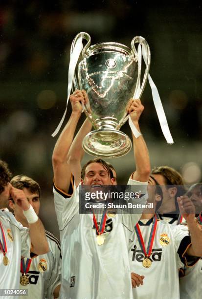 Fernando Redondo of Real Madrid lifts the trophy after the European Champions League Final 2000 at the Stade de France, Saint-Denis, France. Real...