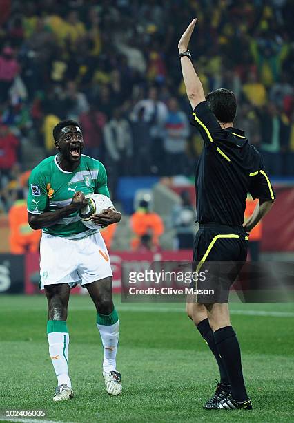 Kolo Toure of the Ivory Coast shouts at referee Alberto Undiano after he makes a decision during the 2010 FIFA World Cup South Africa Group G match...