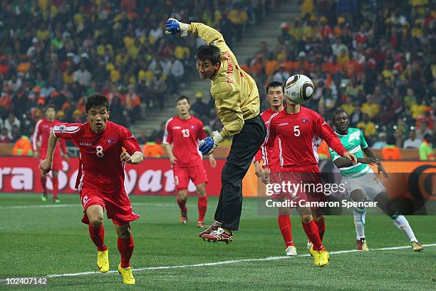 Goalkeeper Ri Myong-Guk of North Korea watches the ball go wide during the 2010 FIFA World Cup South Africa Group G match between North Korea and...