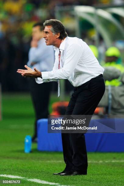 Carlos Queiroz head coach of Portugal encourages his players during the 2010 FIFA World Cup South Africa Group G match between Portugal and Brazil at...