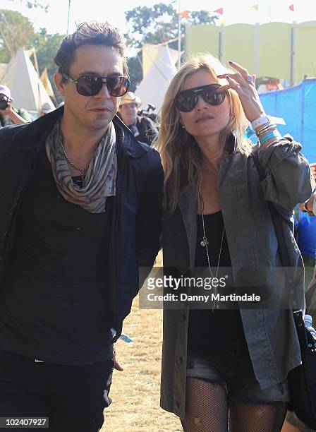 Jamie Hince and Kate Moss attend Glastonbury Festival at Worthy Farm on June 25, 2010 in Glastonbury, England.