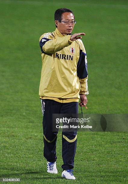 Japan coach Takeshi Okada gives instructions at a Japan training session during the FIFA 2010 World Cup at Outeniqua Stadium on June 25, 2010 in...