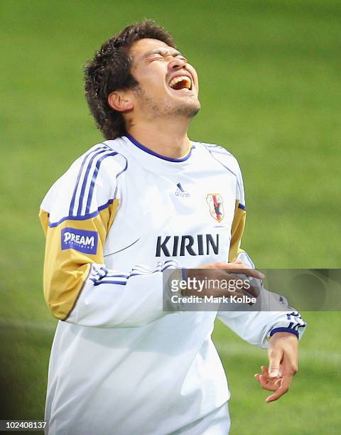 Daiki Iwamasa laughs at a Japan training session during the FIFA 2010 World Cup at Outeniqua Stadium on June 25, 2010 in George, South Africa.