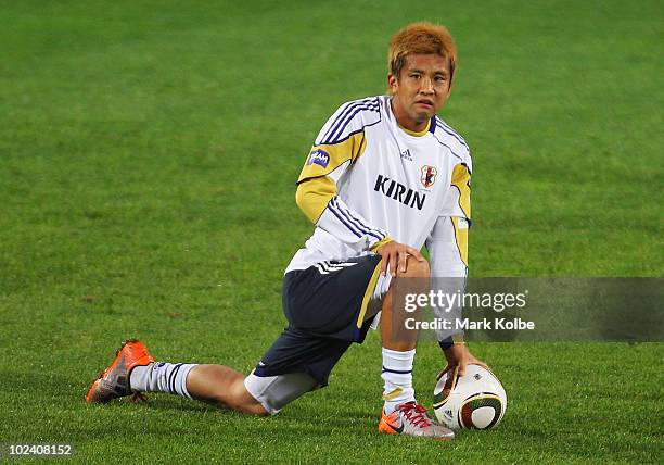 Junichi Inamoto stretches at a Japan training session during the FIFA 2010 World Cup at Outeniqua Stadium on June 25, 2010 in George, South Africa.