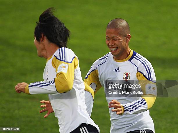 Takayuki Morimoto laughs at a Japan training session during the FIFA 2010 World Cup at Outeniqua Stadium on June 25, 2010 in George, South Africa.