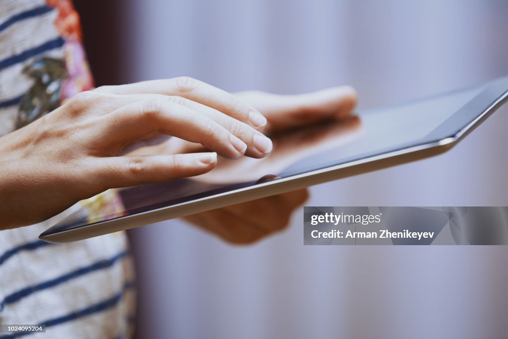 Worker Using Tablet Computer Freelance Worker At Home Using Tablet Computer High-Res Stock Photo ...