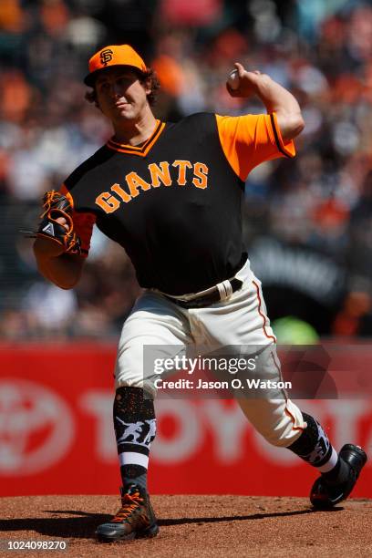 Derek Holland of the San Francisco Giants pitches against the Texas Rangers during the first inning at AT&T Park on August 26, 2018 in San Francisco,...