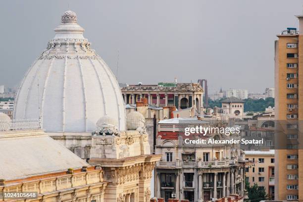 high angle view of bucharest cityscape with dome of national history museum on the left - bukarest city stock-fotos und bilder