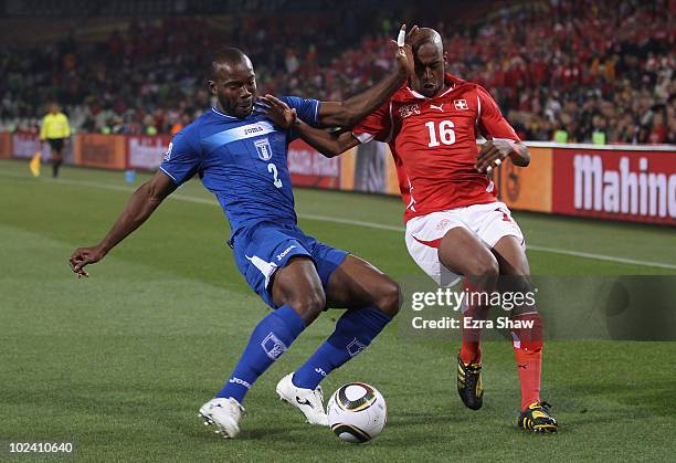 Osman Chavez of Honduras and Gelson Fernandes of Switzerland battle for the ball during the 2010 FIFA World Cup South Africa Group H match between...