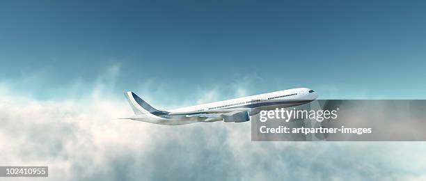 airbus a330-300 plane take off above the clouds - airplane in sky stock pictures, royalty-free photos & images