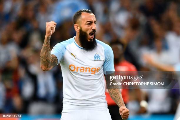 Marseille's Greek forward Konstantinos Mitroglou celebrates after the second goal during the French L1 football match between Marseille and Rennes at...