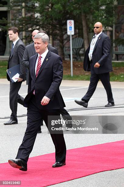 Canadian Prime Minister Stephen Harper attends a welcoming ceremony at the G-8 summit at the Deerhurst Resort at Muskoka June 25, 2010 in Huntsville,...