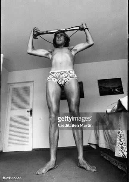James Hunt , British racing driver, 29 years old, at home working out, UK, 16th September 1977.
