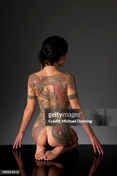 dragon tattoo lady - white dragon tattoo stock pictures, royalty-free photos & images