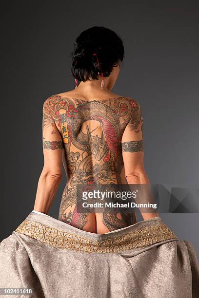 dragon tattoo lady - white dragon tattoo stock pictures, royalty-free photos & images