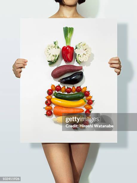 the body made with vegetables  - digestion stockfoto's en -beelden