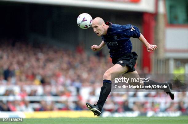 August 1999 - Premiership Football - Arsenal v Manchester United - Jaap Stam of Manchester United heads the ball -