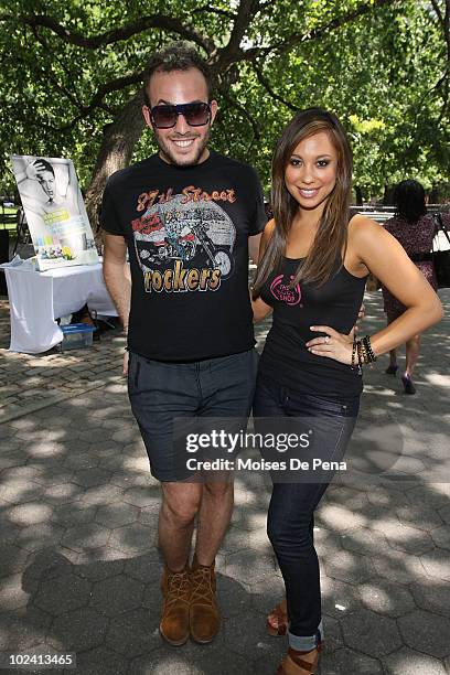 Micah Jesse and Cheryl Burke attend the launch of DeoDry at Tompkins Square Park on June 25, 2010 in New York City.