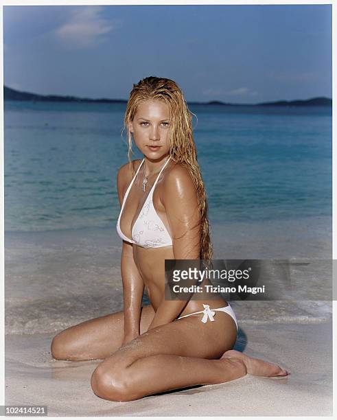 Swimsuit Issue 2004: Tennis player Anna Kournikova poses for the 2004 Sports Illustrated swimsuit issue on October 7, 2003 at El Conquistador Resort...