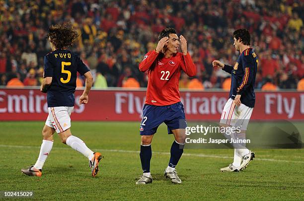 Esteban Paredes of Chile reacts to a missed chance during the 2010 FIFA World Cup South Africa Group H match between Chile and Spain at Loftus...